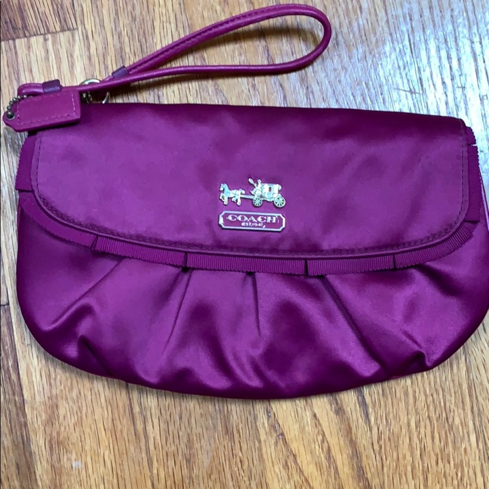Coach satin fuchsia wristlet clutch